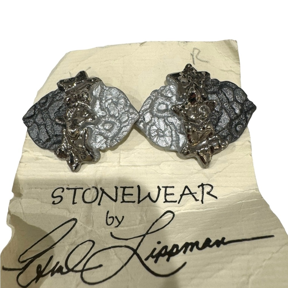 Metallic silver stoneware earrings by Ethel Lippman.